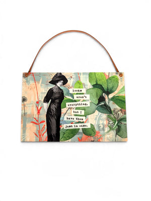 Looks Aren't Everything Vintage Ephemera Wall Art