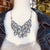 Grace Handmade Intricate Beaded Bib Design and Earrings Set (Metal Foil Silver and Navy Blue)